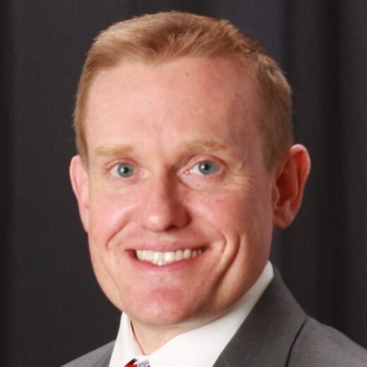 Headshot of John Clarke